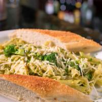 Frikin' Chicken Pasta · Penne noodles tossed in our light basil pesto cream sauce with grilled chicken breast, fresh...