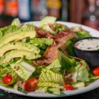 Blt Salad With Avocado · A bed of crispy romaine lettuce smothered in bacon, then topped with sliced tomatoes and fre...