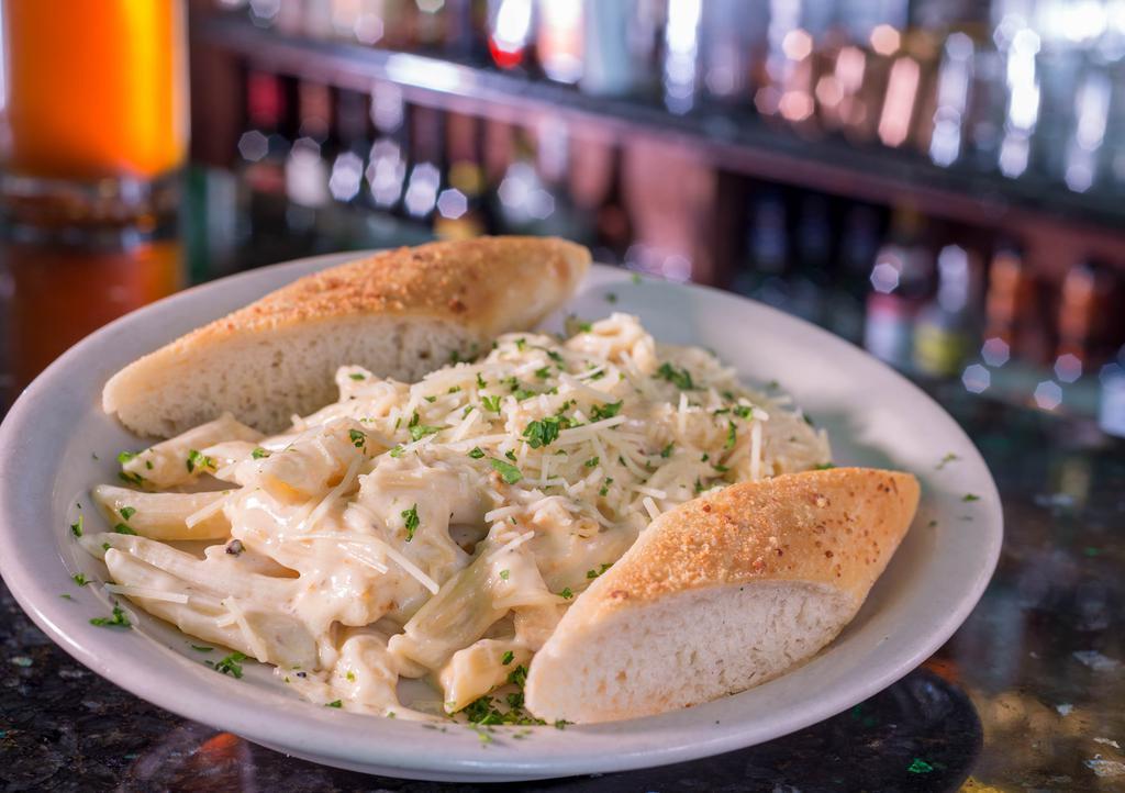 Alfredo Chicken · Grilled chicken breast with penne pasta tossed in our famous creamy Alfredo sauce and finished with Parmesan cheese.