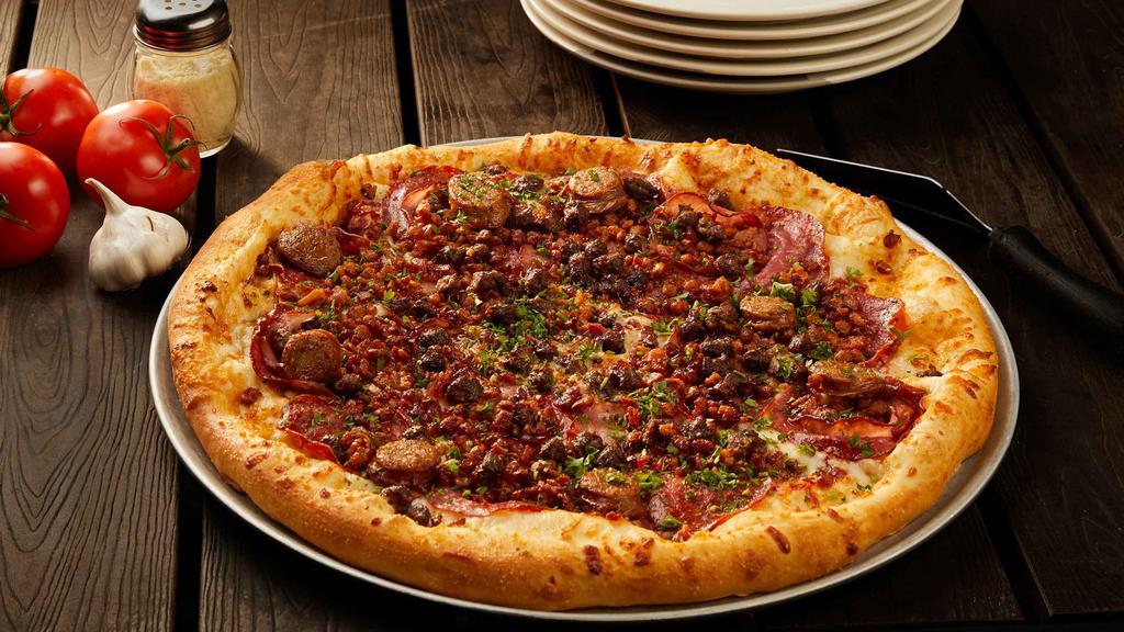 Sch'Meat'Za Pizza · Canadian bacon, crumbled Italian sausage, genoa salami, pepperoni, ground beef, bacon and sliced spicy Italian link sausage.