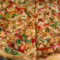 Spicy Thai Pizza · Garlic chicken, roasted red peppers, fresh cilantro and crushed red peppers on our spicy pea...