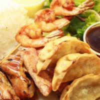 House Combo · Chicken Teriyaki with 3 pieces of Gyoza and 3 Shrimp Skewers. Served with rice and salad!