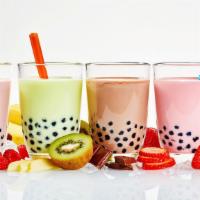 Matcha Green Tea · A sweet and delicious matcha green tea flavored bubble tea. Chewy tapioca balls and rainbow ...