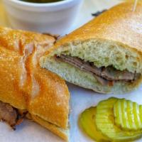 French Dip · Roast beef, swiss cheese, with Au jus.