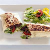 Aladdin'S Shawarma Special Sandwich · Your choice of chicken or lamb, tenderly cooked and marinated in our special house sauce, to...