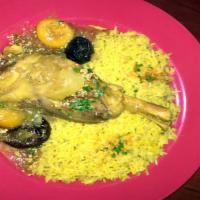 Morroccan Lamb Shank Lunch Special · Honey glazed lamb shank garnished with plums and apricots. Served with rice. Gluten free.