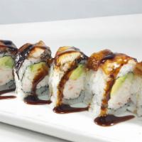 Dragon Roll · In: cucumber, avocado, crab. Top: avocado with yumyum sauce.