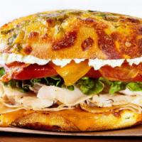 Good Vibes Turkey · A fresh-baked green chile cheese artisan roll topped with turkey, thick-cut bacon, cheddar, ...