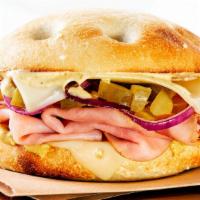 Up In Smoked Ham · A fresh-baked  sea salt focaccia roll topped with shaved ham, melted Swiss cheese, chopped p...