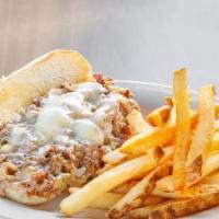 Philly Cheesesteak · Tender, thinly sliced Sirloin griddled with Onions, Jalapeños and melted Swiss on a Hoagie R...
