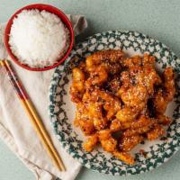 Sesame Chicken · Hot and spicy. Served with sesame seeds on top.