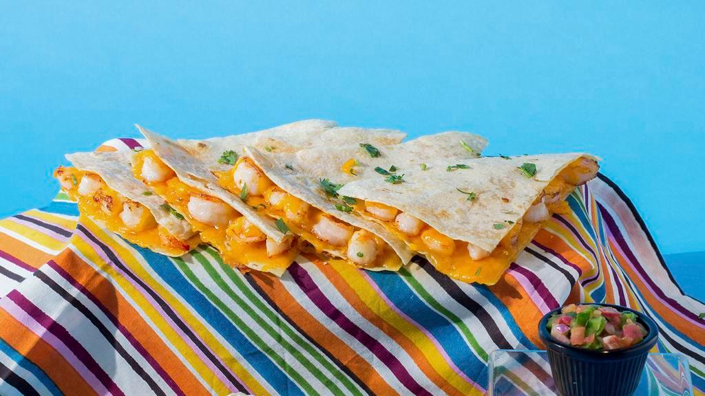 Shrimp Quesadilla · Shrimp and shredded melted cheese in a crispy flour tortilla and served with a side of sour cream.