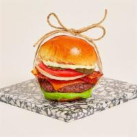 Bacon Cheeseburger Slider · Juicy Kobe beef patty with crispy bacon, melted cheddar cheese, lettuce, tomato, onion, pick...