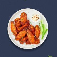 Classy Classic Wings · Breaded or naked fresh chicken wings until golden brown. Served with a side of ranch or bleu...