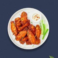 Classic Cluster Boneless Wings · Boneless breaded fresh chicken wings until golden brown. Served with a side of ranch or bleu...