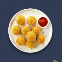 Mac It Cheesy Balls · 10 Bite-size clumps of mac and cheese breaded and fried until golden brown. Served with your...
