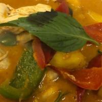 Mango Curry · All curry starts at level 2 spiciness. fresh mango in red curry paste with bell pepper and T...