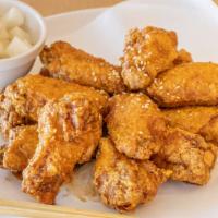 Soy-Garlic Fried Wings 14Pcs. · Seasoned soy-garlic fried chicken wings 14pcs.