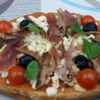 Bruschetta · Marinated Artichoke, Roasted Basil Pesto Tomato, and Fresh Mozzarella with Aged Balsamic on ...