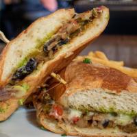 Mushroom Philly · Sautéed Mushroom, Onion, & Bell Pepper, melted Provolone and Chimichurri Aioli on a grilled ...