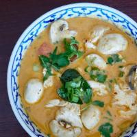 Tom Kha · Coconut Milk cooked with galangal, lime leaves, lemon grass, lime juice, tomatoes and mushro...
