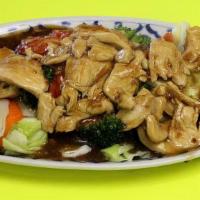 Garlic Chicken · Sautéed chicken with lots of garlic sauce served on top of steamed vegetables.