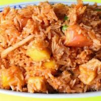 Mango Fried Rice · Fried rice with beds of mango, vegetables, egg, raisins, carrots, peas and onions.