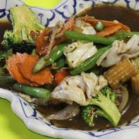 Pad Woon Sen · Stir fried vermicelli noodles with houses vegetables, squid, prawns, and egg.