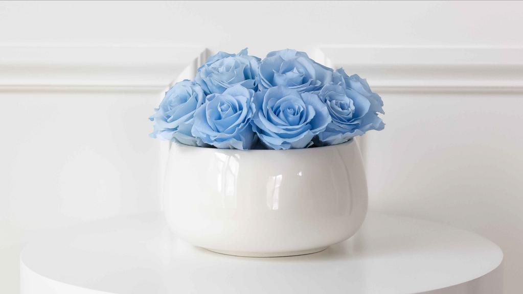 Sonoma Rose Arrangement With Blue Roses · Sonoma includes the most beautiful Premium Preserved Roses, hand-crafted in a creamy white ceramic vase. With this arrangement you’ll get 13-15 roses arranged in a beautiful bowl vase. Our Premium Preserved Rose compositions make for a memorable gift for you or someone special! Vase size: 6 3/4