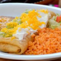 Chimichanga Dinner · Our Chimichangas are delicate and crisp. Choose your filling, we'll roll it in a flour torti...