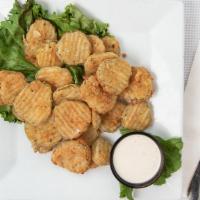 Fried Pickles · Hand battered sliced sweet dill pickles served with sweet and tangy sauce.