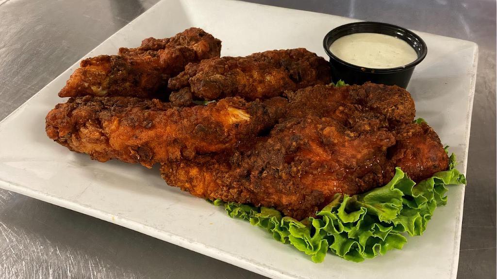Boneless Chicken Tenders · Crispy chicken tenders served with ranch or blue cheese dressing.