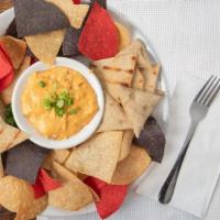 Buffalo Chicken Dip · Oven roasted chicken mixed with buffalo sauce, crumbled blue and house blend cheeses and ser...