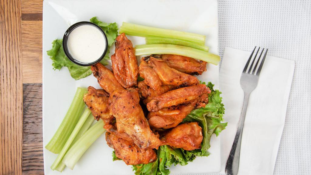 10 Chicken Wings · Jumbo wings tossed in your choice of sauce and served with celery and ranch, bleu cheese or cajun ranch.