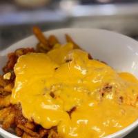 Chili Cheese Fries · Signature fries, house-made chili, cheddar beer cheese.