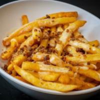 Bacon Cheese Fries · Signature fries, crispy bacon, and our house cheese blend.