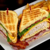 810 Club · Our triple-decker piled high with ham, turkey, applewood bacon, swiss and american cheeses, ...