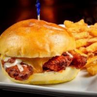 Chicken Tender Melt Sandwich · Served fried, tossed in your choice of wing sauce, topped with melted cheddar-jack cheese. C...
