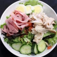 Chef Salad · Fresh greens topped with ham, turkey, bacon, hard boiled egg, cheddar-jack, diced tomatoes, ...