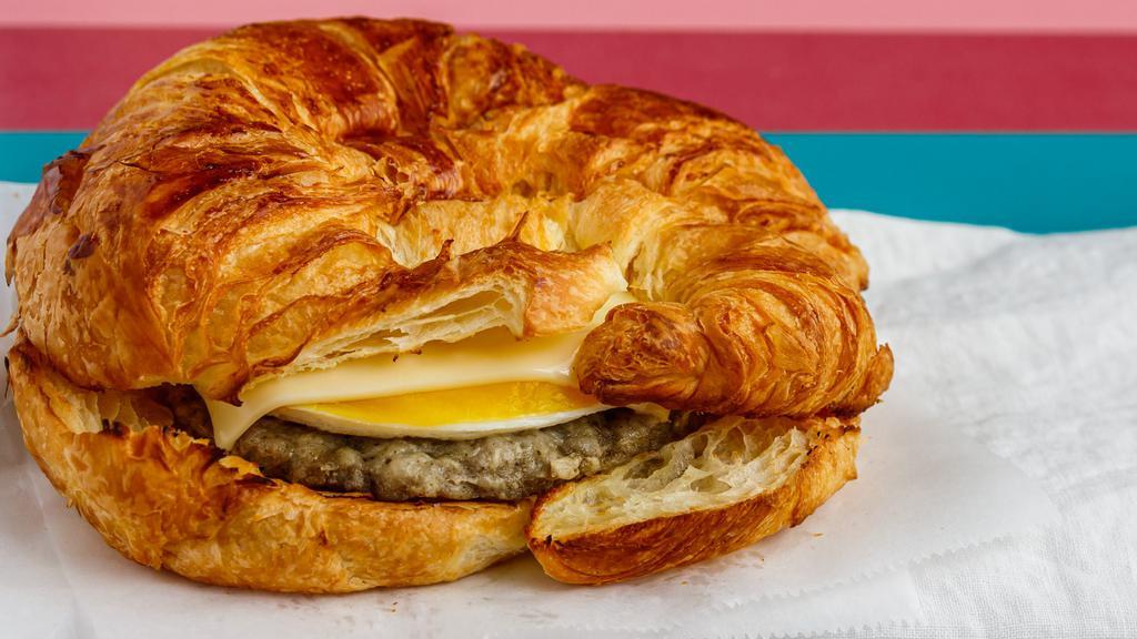 (Breakfast) Croissant Sandwich · Croissant with egg and cheese and your choice of ham, sausage, or bacon