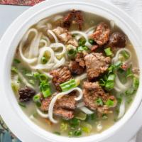 Beef Noodle Soup · Beef, cabbage, mushrooms, bamboo shoots, carrots, zucchini