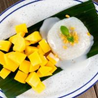 Mango Sticky Rice · Coconut flavor sticky rice with seasonal mango and homemade coconut sauce