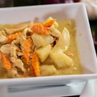 Yellow Curry · Thai, Southern-style, mild and slow-cooked coconut curry with onion, carrots and potatoes. S...