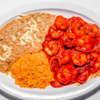 Camarones A La Diabla · Shrimp served with exquisite Mexican hot sauce. Served with rice and beans.