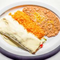 Fajita Burrito · Your choice of chicken or steak. Mixed with bell peppers and onions, topped with white chees...