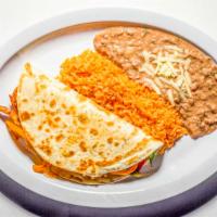 Fajita Quesadilla · Your choice of chicken or steak. Served with rice, lettuce, and sour cream.