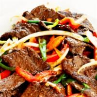 Mongolian Wonder · BBQ beef less protein, yellow onions, red and green bell peppers sautéed in our homemade sav...