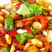 Spicy Kung Pao · Spicy. Tender non-GMO soy protein, bell pepper, onion, carrot, pineapple and peanuts sautéed...