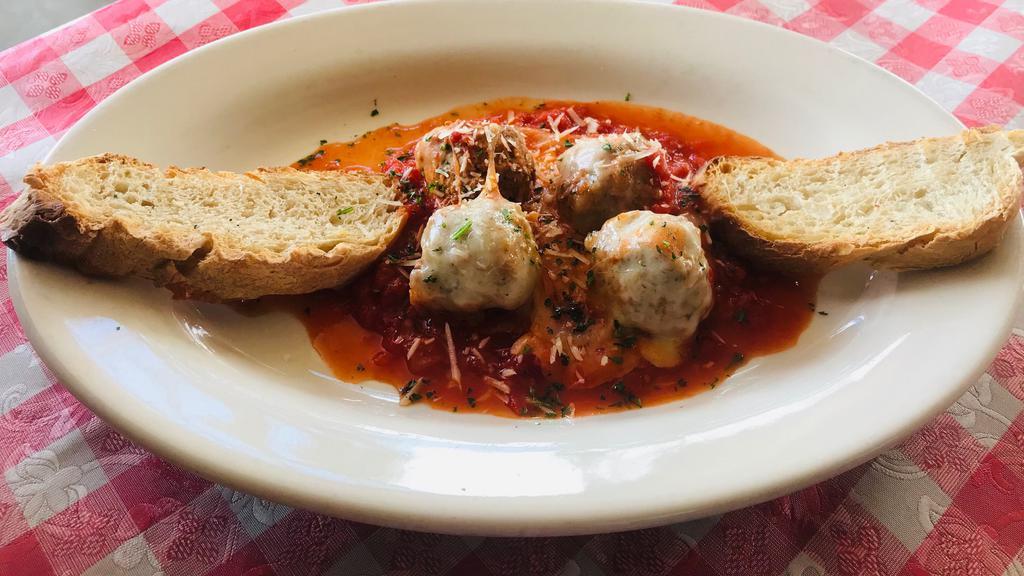 Mario'S Meatballs · Four house made meatballs in marinara sauce topped with melted mozzarella served with toasted ciabatta bread.