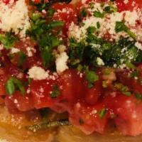 Bruschetta · Toasted ciabatta bread topped with fresh diced tomatoes, garlic, basil, and a drizzle of ext...